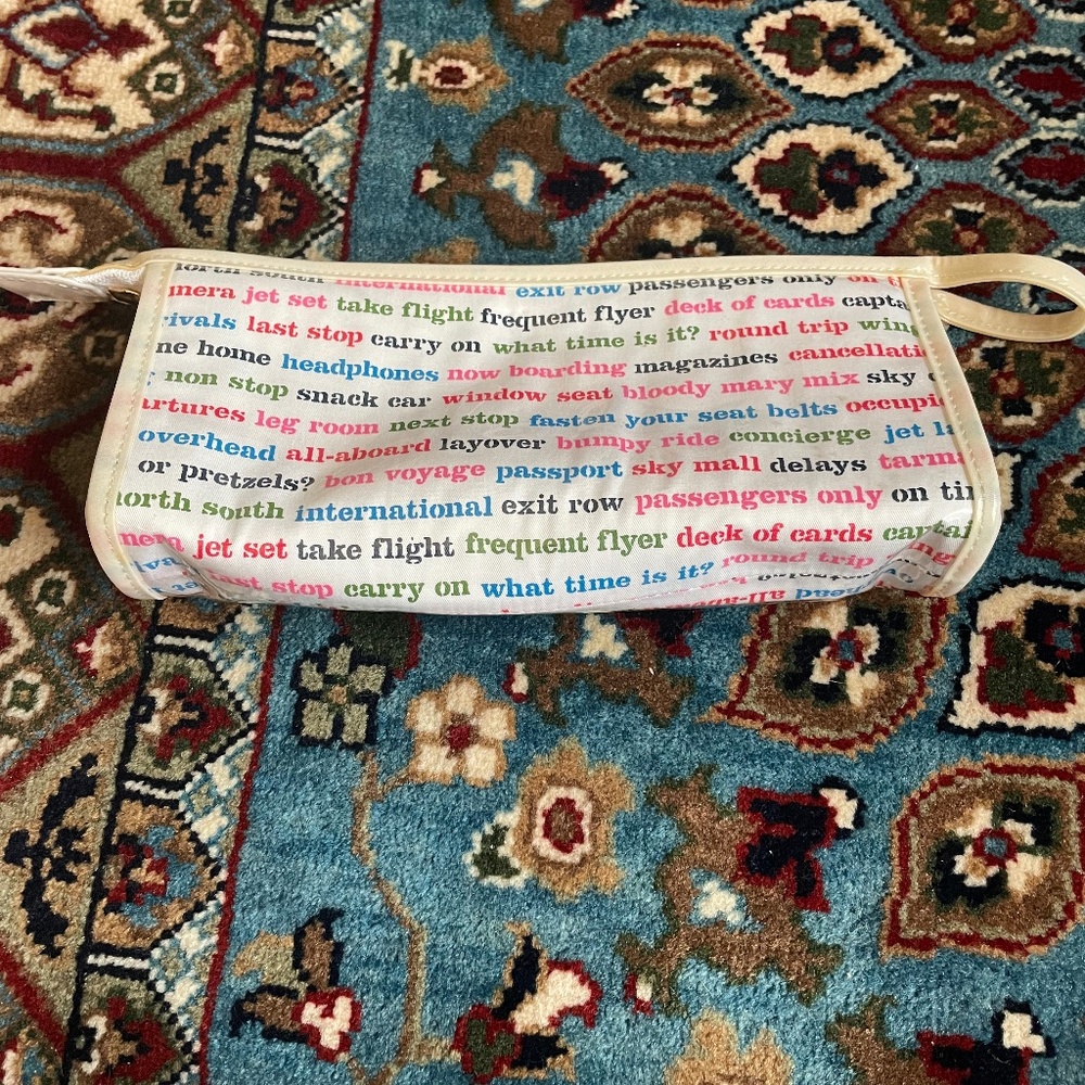 Kate Spade White with Colorful Airplane Trip Sayings Small Makeup Bag